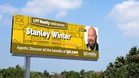 a billboard advertising stanley winer